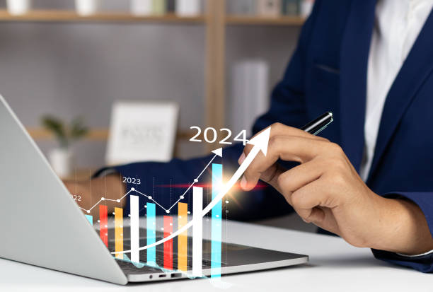 istock Businessman profit analysis with augmented reality in 2024, 2024 positive indicators profitability and growth in business, businessman financial strategy calculating long term Investments for success. 1830337651