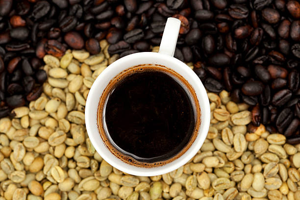 istock Cup of black Ethiopian coffee on beans background. 183033926