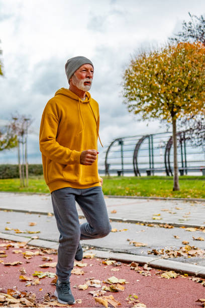 istock Senior athlete running outdoors in the city. 1830344205