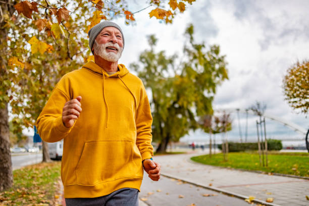 Senior man out for a run in the park