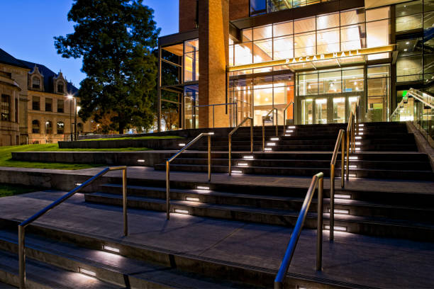 University of Washington's Paccar Hall at night PROPERTY RELEASE ON FILE. Completed in the summer of 2010, Paccar Hall is one of two state-of-the-art buildings developed as part of an expanded campus for the University of Washington Michael G. Foster School of Business. Photographed at twilight. outdoor staircase stock pictures, royalty-free photos & images