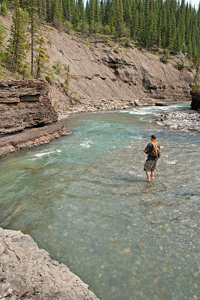 istock Man Flying Fishing For Trout 183035271