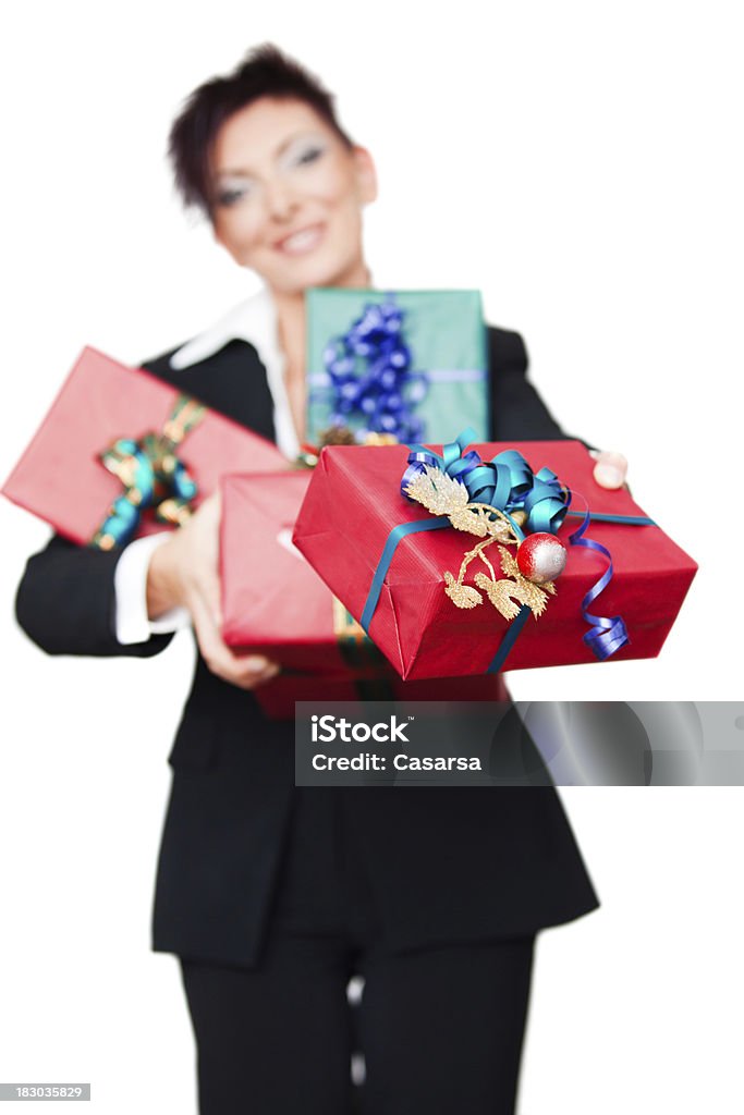 Offering presents Businesswoman offering presents. A Helping Hand Stock Photo