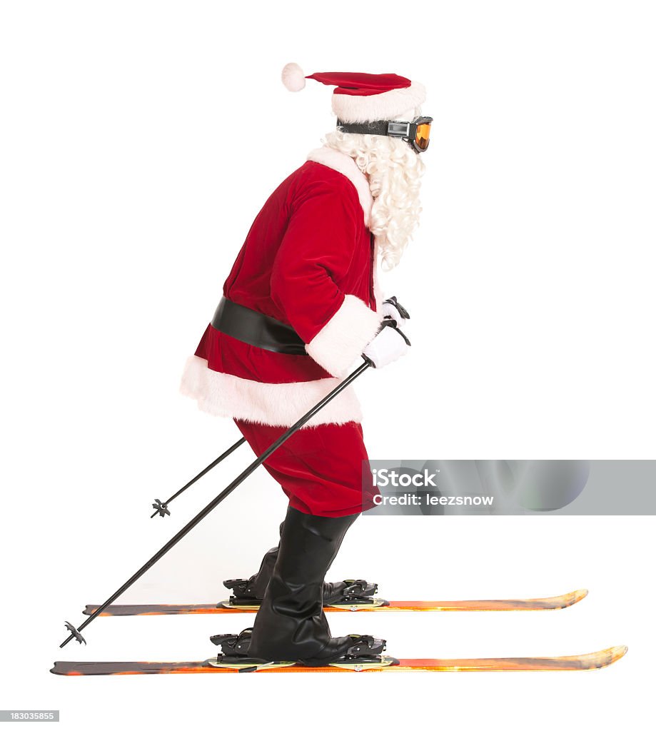 Skiing Santa Claus on White - Sports Series Santa Claus skiing.   Isolated on white. Santa Claus Stock Photo