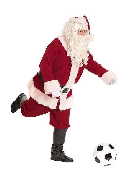 istock Santa Playing Soccer on White Background 183035859