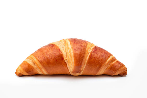 istock Fresh traditional croissant isolated on white. 1830361573