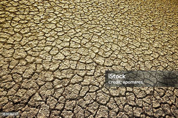 High Contrast Image Of Cracked Dry Soil Stock Photo - Download Image Now - Backgrounds, Barren, Broken