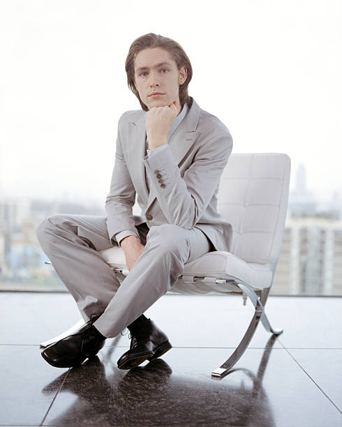 istock Young Businessman sitting in penthouse office 183037147