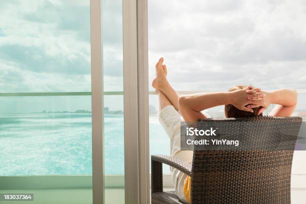 Relaxing In Hotel Balcony With Scenic Beach And Sea Views Stock Photo - Download Image Now