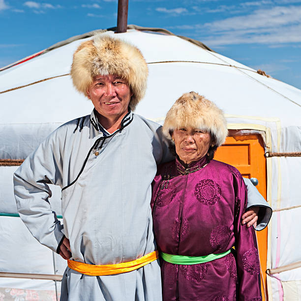 istock Mongolian couple in national clothing 183037998