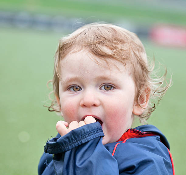 istock Small boy on football field 183038509