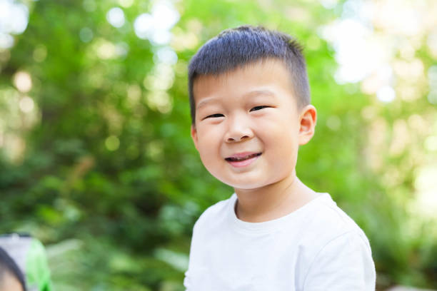 istock A Little Boy's Journal Amongst the Trees 1830386969