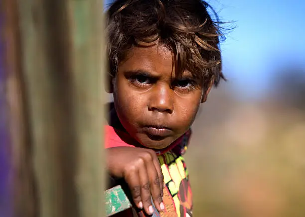Indigenous boy with intense expression