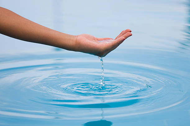 istock handful of life giving water 183038772