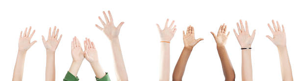 Children's Hands Reaching Up in the Air, Isolated on White