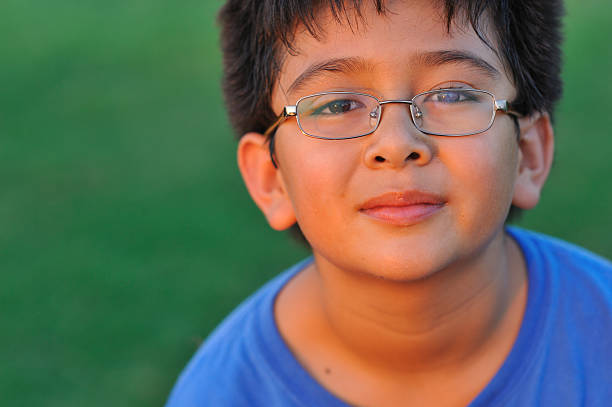 istock Headshot of young boy at sunset 183039567