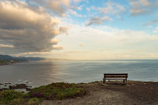 istock sea landscape with bench 1830395731