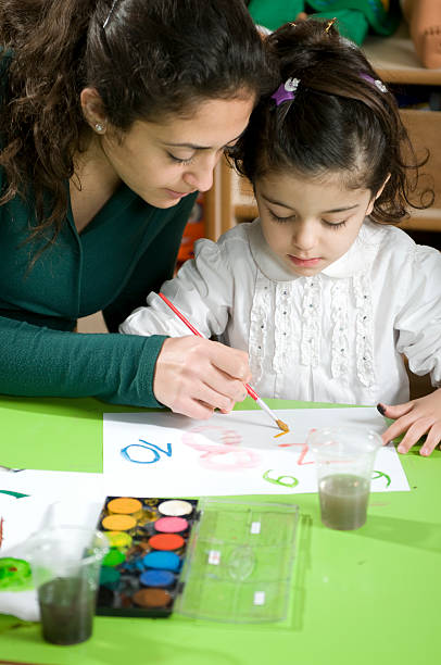 istock Preschoolers and Teacher 183039679