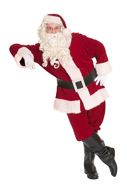 Santa leaning on a blank space, ready for you to insert your item.   Isolated on white.
