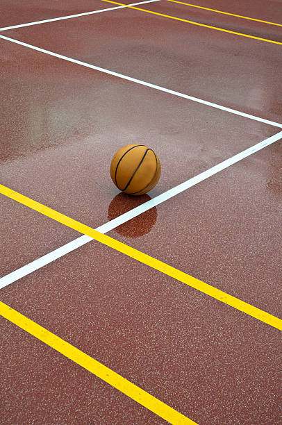 istock Basketball on a Wet Court 183040601