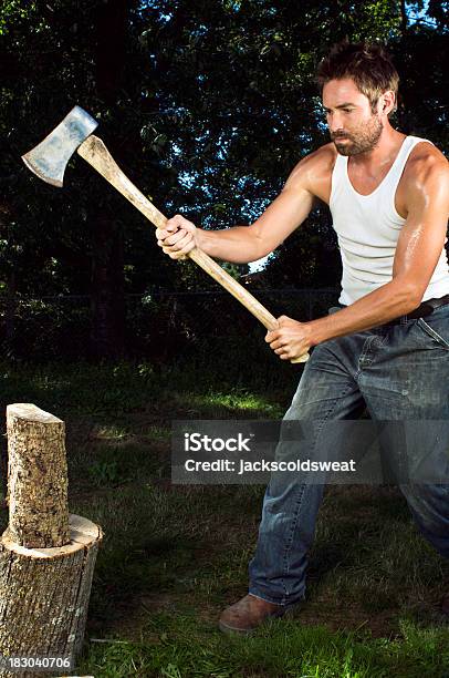 Chopping Wood Stock Photo - Download Image Now - 20-24 Years, 20-29 Years, 25-29 Years