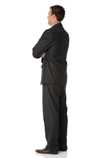 Businessman standing with his arms crossedhttp://www.twodozendesign.info/i/1.png