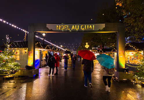 Geneva, Switzerland - December 1, 2023: Christmas market at the Quai du Mont Blanc is the most majestic Christmas fair in Geneva.