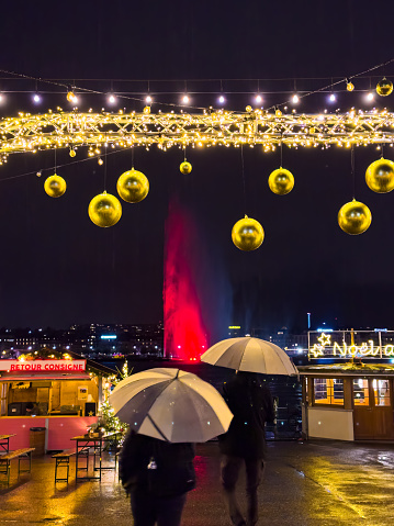 Geneva, Switzerland - December 1, 2023: Christmas market at the Quai du Mont Blanc is the most majestic Christmas fair in Geneva.