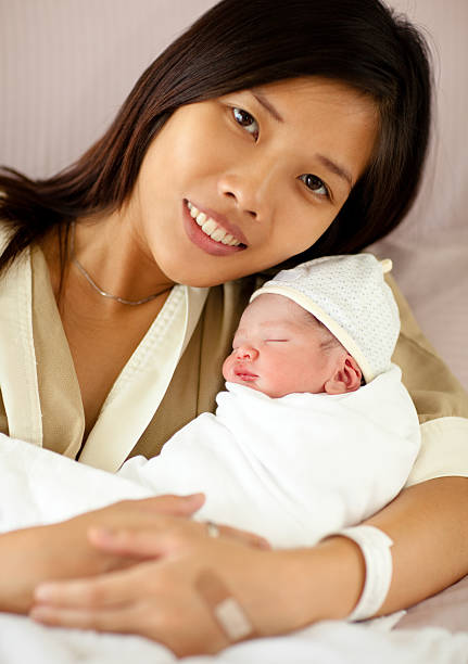 istock Mother with a Newborn 183041228
