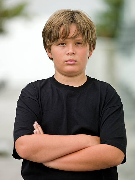 istock Child with his arms crossed 183041297