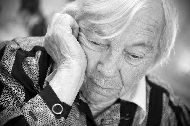 istock Elderly woman looks sad 183041428