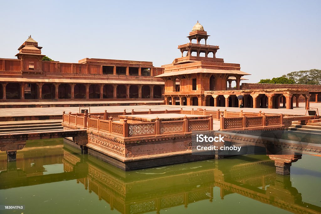 Fatehpur Sikri - Panch Mahal "Panch MahalFatehpur Sikri (Hindi:  AA< AA AYa! AA AA AYA AA  AA AYa Aa AA AYa, Urdu: AAA-AEA AAA) is a city and a municipal board in Agra district in the state of Uttar Pradesh, India. The historical city was constructed by Mughal emperor Akbar  beginning in 1570 and served as the empire's capital from 1571 until 1585. Though the court took 15 years to build, it was abandoned after only 14 years because the water supply was unable to sustain the growing population." Panch Mahal Stock Photo