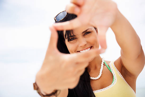 istock Happy young female makes a frame with her hands 183041873