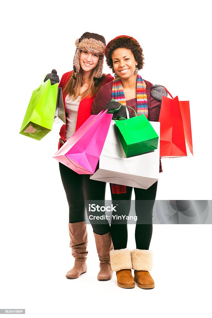 Chica adolescente; Mujeres jóvenes Navidad compras para días festivos, sobre blanco - Foto de stock de Bolsa de la compra libre de derechos