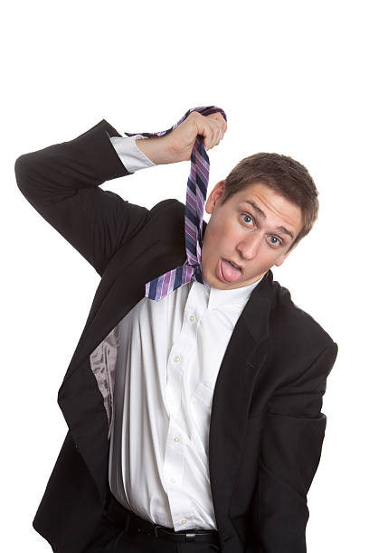istock Man in Suit Hanging Himself with His Tie 183041908