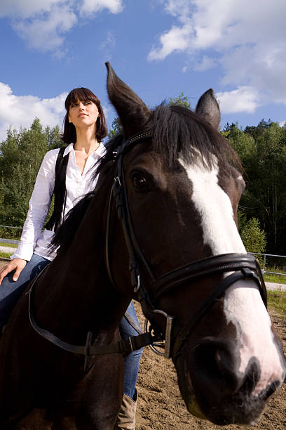 istock woman on horse 183042195