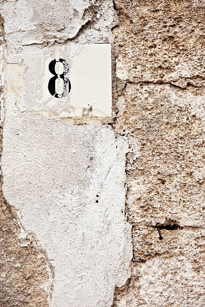 istock 8, Street Number On The Wall 183042213