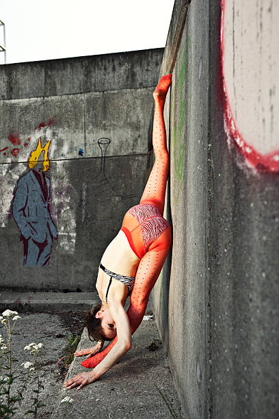 istock young flexible woman outdoor 183042312