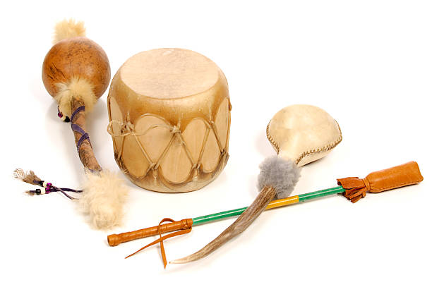 Native American Drum And Rattles "A Native American drum, beater stick and rattles on white." rattle drum stock pictures, royalty-free photos & images