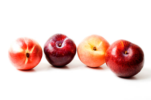 frutas - isolated on white high key saturated color horizontal - fotografias e filmes do acervo