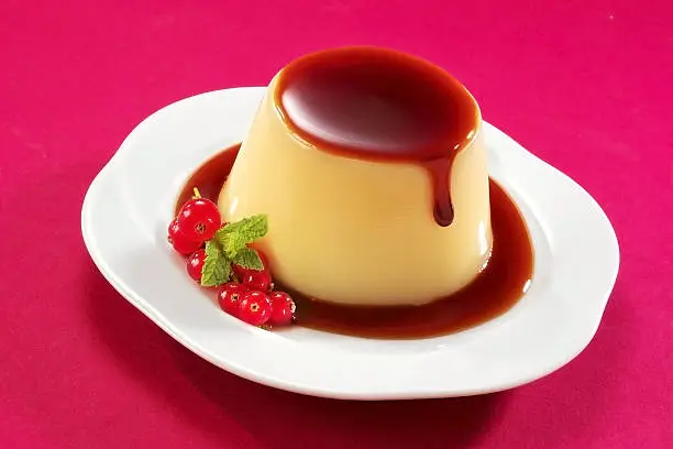 creme caramel with red fruits