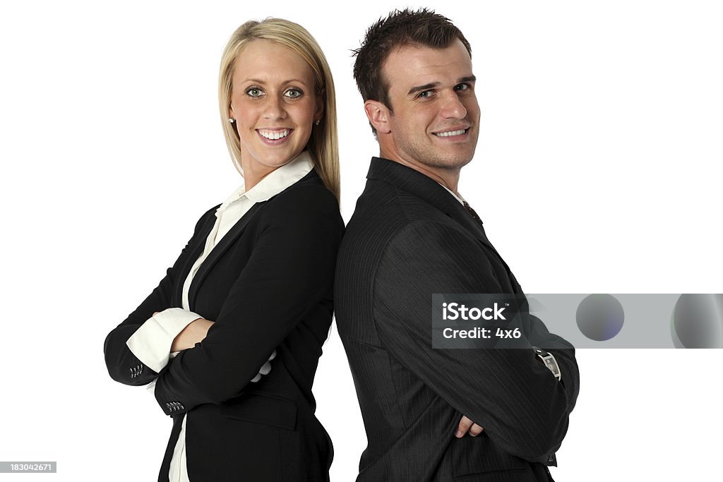 Business executives smiling Business executives smilinghttp://www.twodozendesign.info/i/1.png Back To Back Stock Photo