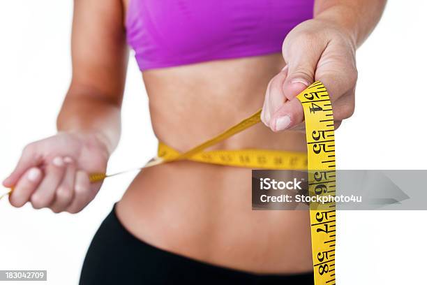 Woman Measuring Her Waist Stock Photo - Download Image Now - 20-29 Years, Adult, Adults Only