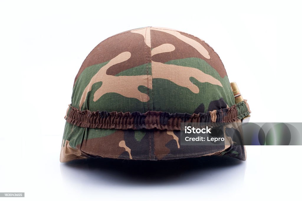 A military helmet isolated on a white background A military helmet of camouflage on white background. Army Stock Photo