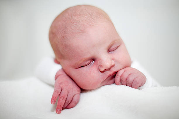 istock New born baby sleeping II 183043918