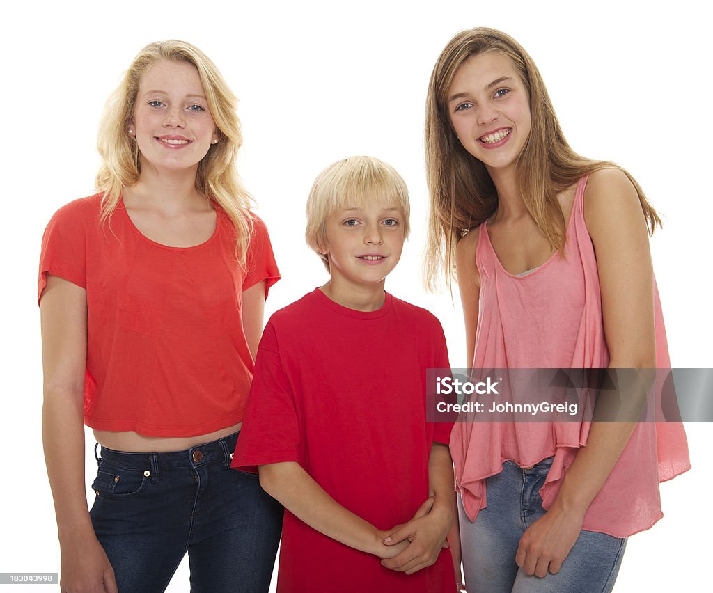 Two teenage girls with younger brother Blond Hair Stock Photo