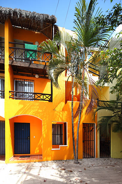 istock Bright orange caribbean house 183044110