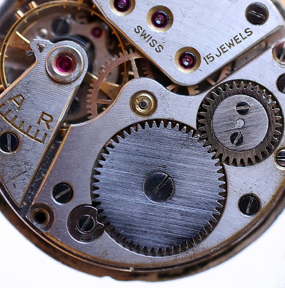 Clock mechanism of an old wristwatch. Macro photography
