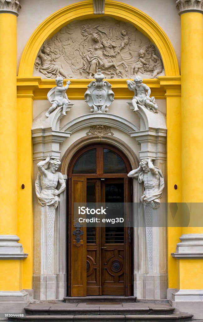 Baroque entrance door, Wilanow palace, Warsaw Baroque entrance door of the Wilanow palace, Warsaw, Poland. Sculptor : Giovanni Francesco Fumo 1678-1749 Architectural Column Stock Photo