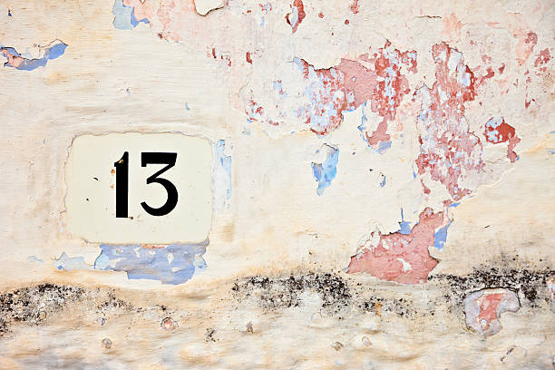 istock 13, Street Number On The Wall 183044506